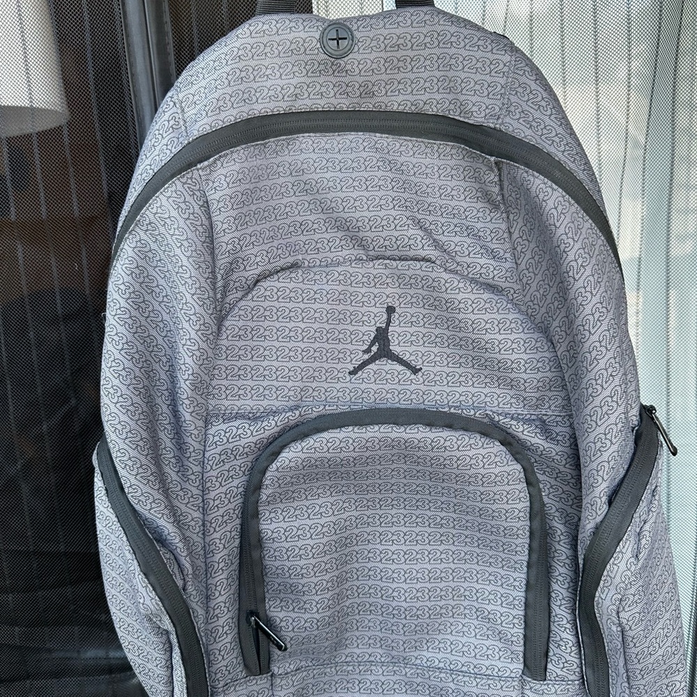 Jordan Gray Backpack with Padded Straps and Durable Design